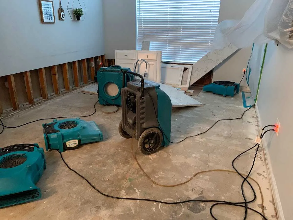 Dehumidifier in flood-cut room for Water Damage Restoration in Houghton