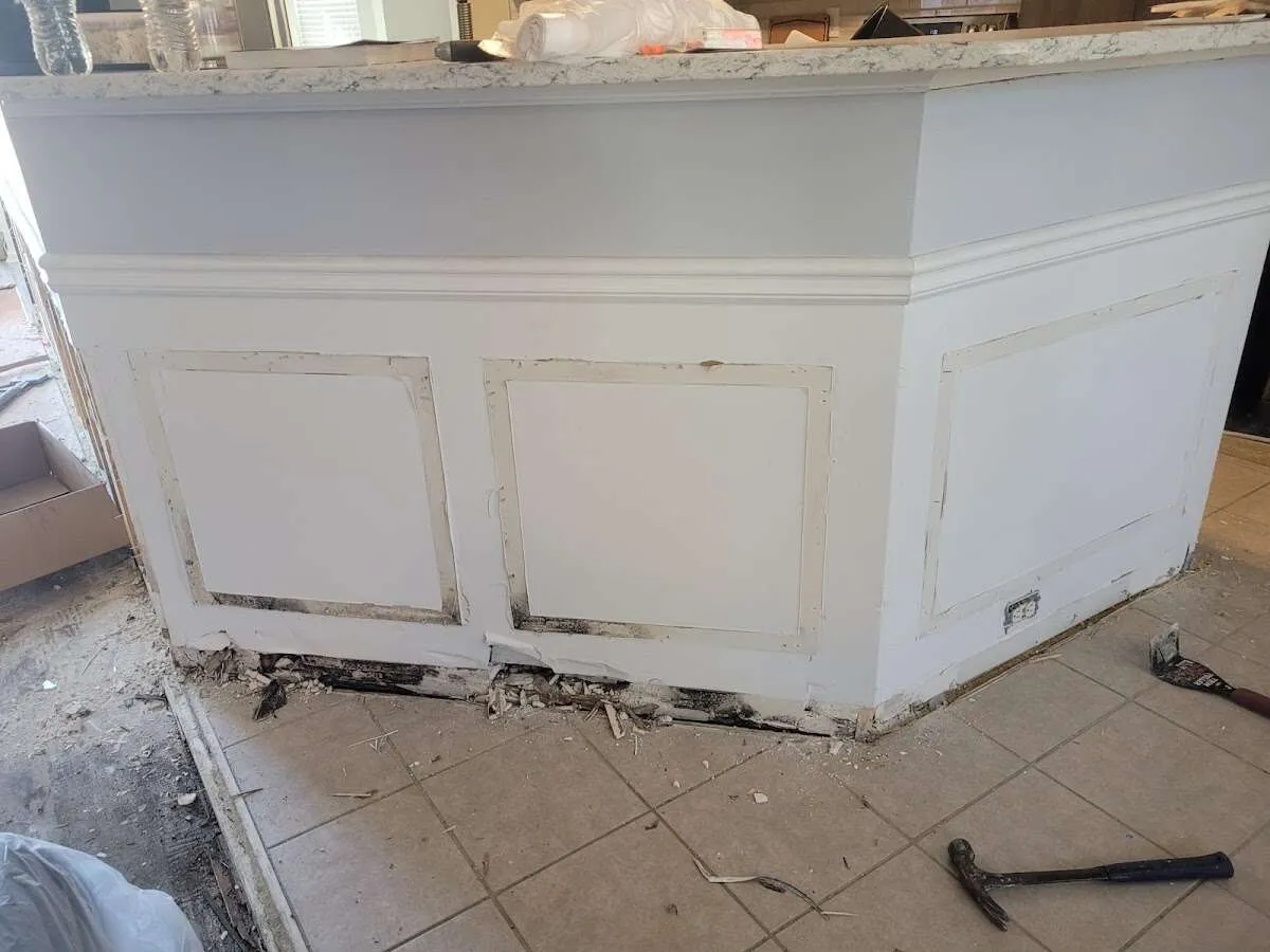 Water damage and mold on kitchen during Storm Damage Restoration in Houghton